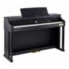 Piano numérique noir élégant avec pédales dorées et pupitre intégré, idéal pour musiciens et passionnés de musique.