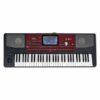 Clavier arrangeur Korg PA700 rouge avec écran couleur, haut-parleurs intégrés et nombreuses touches pour création musicale.