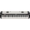 Clavier numérique vintage avec boutons de contrôle et haut-parleurs intégrés noirs, idéal pour la scène ou le studio.