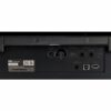 Vue arrière d'un piano numérique Korg avec ports audio, USB et pédales, étiquette du modèle et numéro de série visibles.