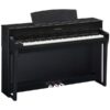 Piano numérique noir Yamaha élégant avec trois pédales, idéal pour les musiciens exigeants et les cours de musique.