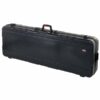 Valise noire rigide pour rangement et transport sécurisé d'instruments de musique, avec poignée robuste.