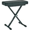 Tabouret de piano réglable noir avec pieds croisés en métal, pour musiciens, confortable et ajustable.