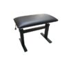 Banc de tatouage noir en métal réglable, équipé d'un coussin matelassé confortable pour les sessions prolongées.