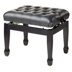 Tabouret de piano noir avec siège matelassé en cuir, style élégant et pieds en bois massif.