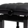 Tabouret de piano en cuir noir tufté, réglable avec bouton latéral noir, structure en bois laqué noir.