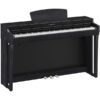 Piano numérique Yamaha noir avec trois pédales, idéal pour salon ou studio, design élégant et moderne.