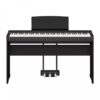 Piano numérique noir avec 88 touches et pédales intégrées, idéal pour les musiciens amateurs et professionnels.