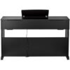 Bureau d'ordinateur noir avec plateau rabattable et espace pour câbles, idéal pour un espace de travail organisé et moderne.