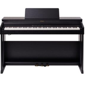 Piano numérique noir avec touches blanches et noires, pupitre et pédales dorées, modèle moderne sur pied.