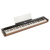 Piano numérique portable avec 88 touches, finitions en bois, écran LCD et supports pour partitions, idéal pour les musiciens.